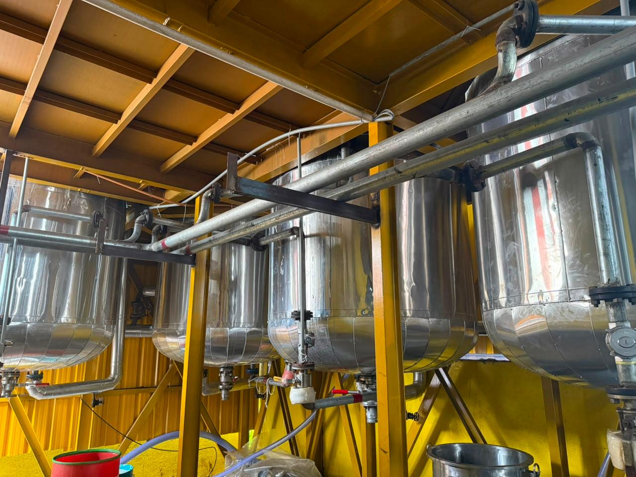 Manufacturing tanks and process infrastructure